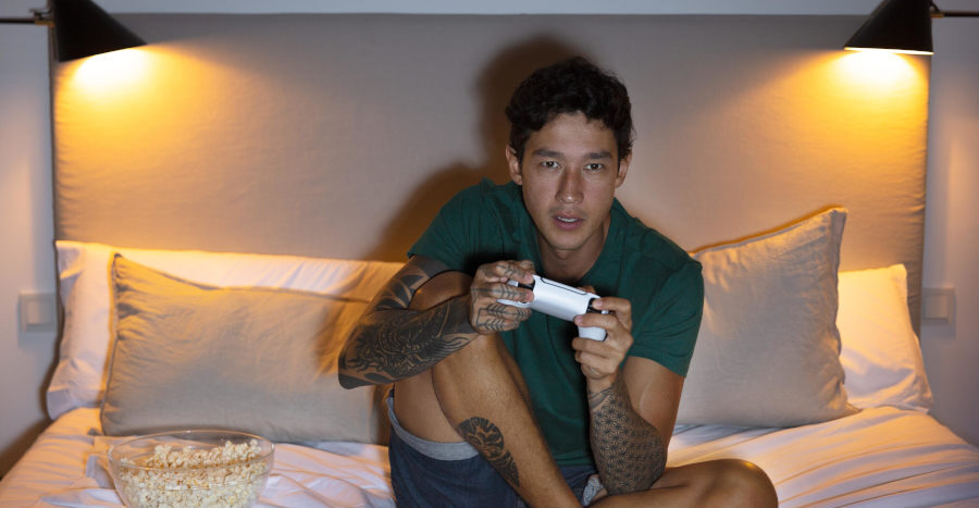 man-playing-video-game-with-his-console